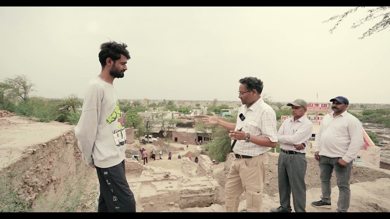 Dr Vinay Kumar Gupta explaining the Bahaj excavation to visitors on site